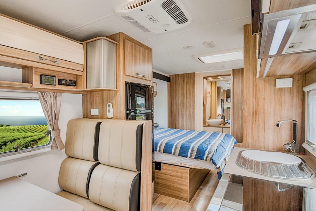 Let's Go Motorhomes' Conquest Royale modern luxury interior, slide out bed and spacious ensuite