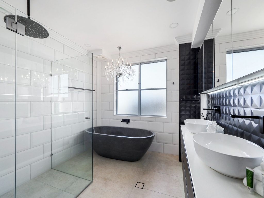 Master bedroom ensuite with bath and shower