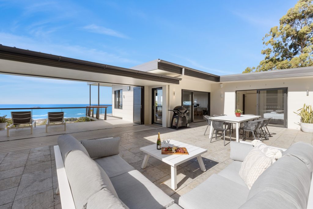 Poolside dining and lounges with ocean views