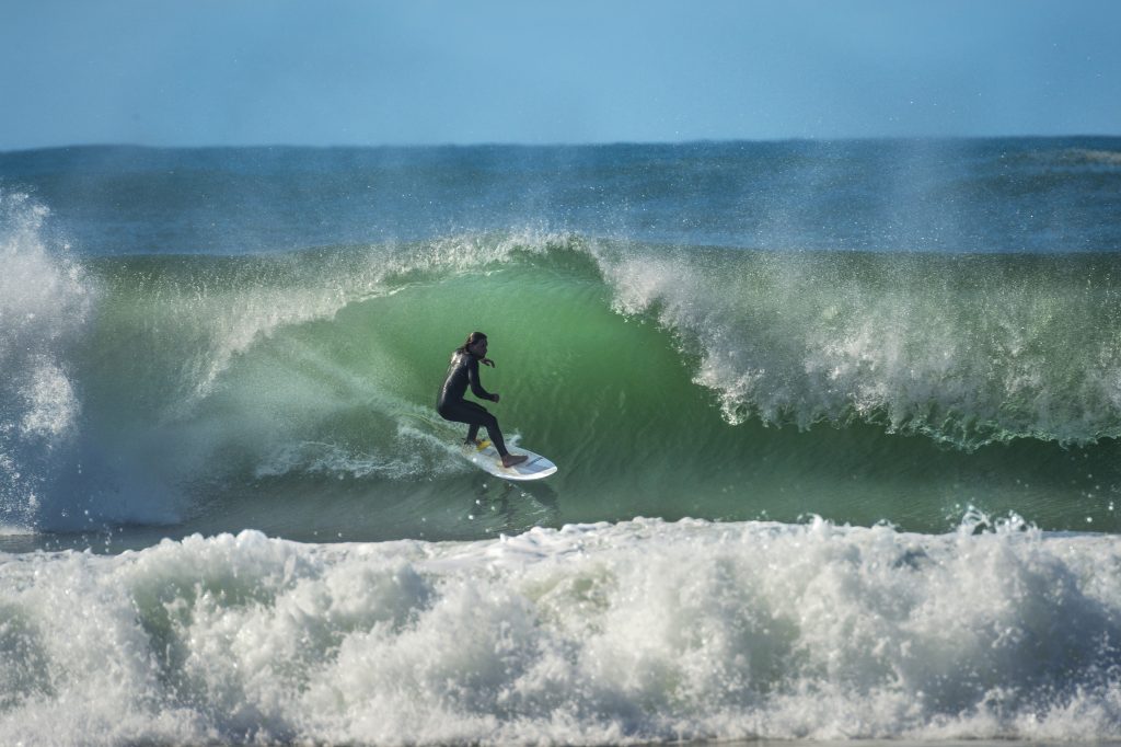 Go surfing at Sawtell Beach 