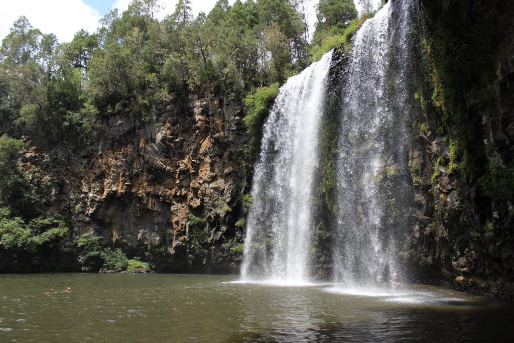An impressive waterfall, it has a rock ledge behind it for those brave enough to swim out to rest on