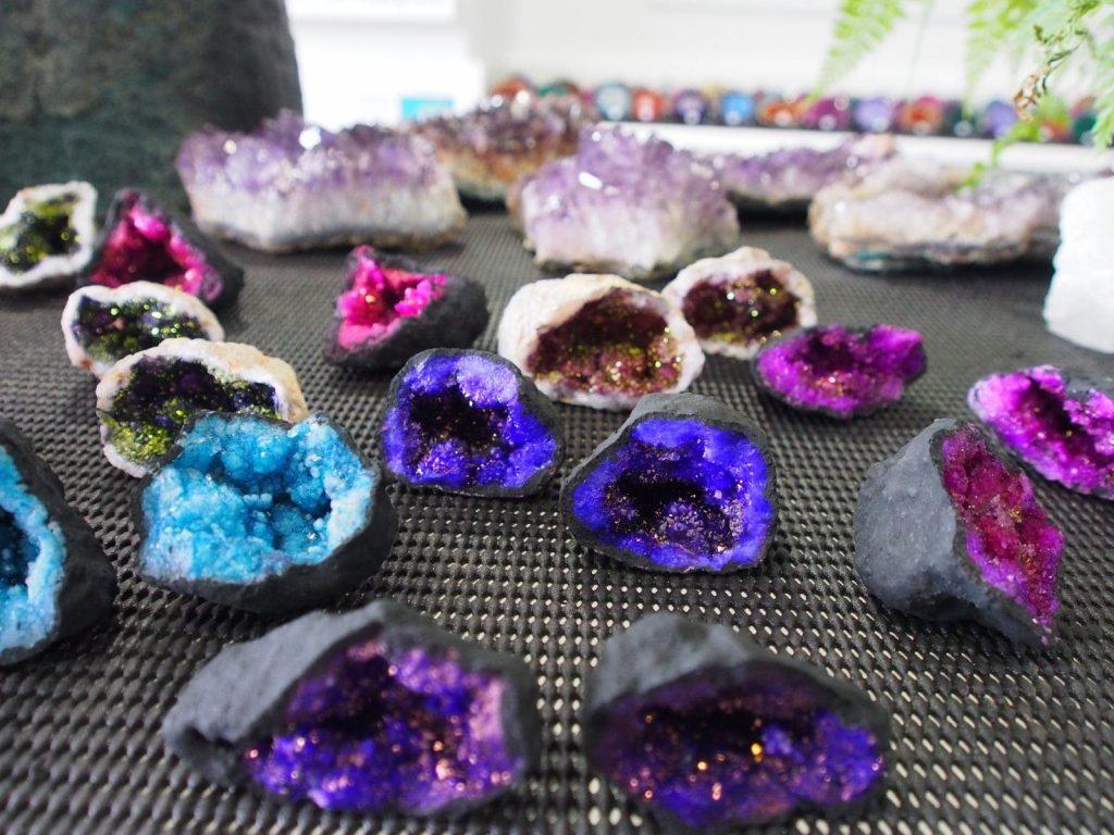 Colourful and bright geode halves from The Opal Centre.