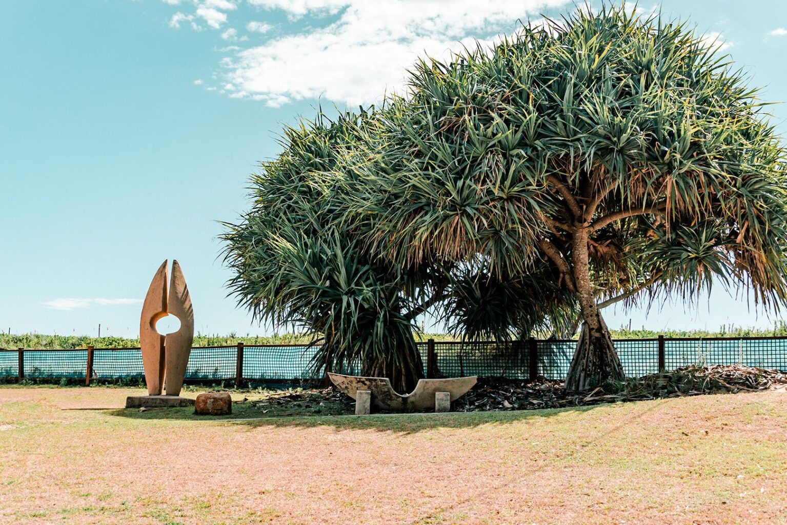 Park Beach Art Sculpture and Pandanus Trees