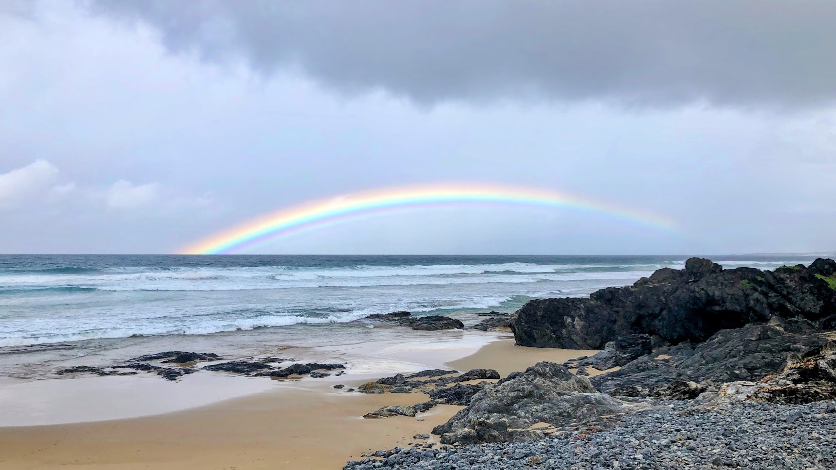 Rocks And Rainbow At Gallows Beach