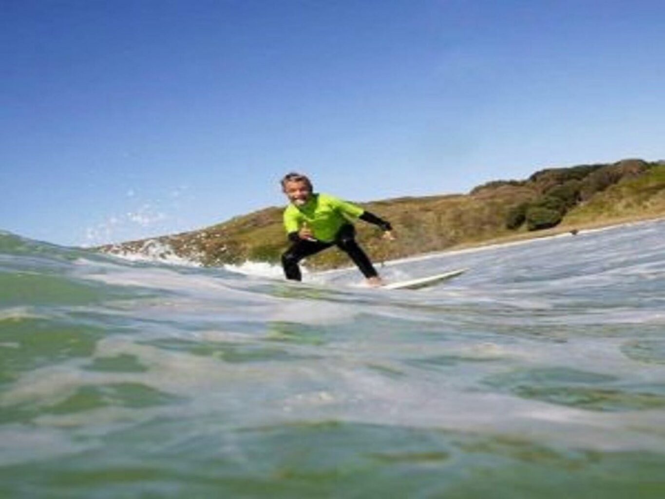 Kids surfing waves